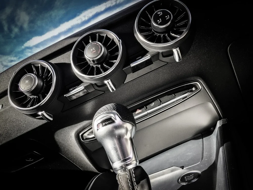 Car dashboard air vents with weak airflow from a failing blower motor