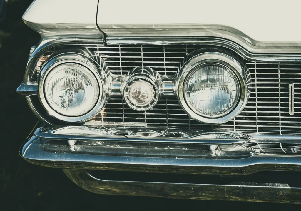 Car headlight being tested for correct beam alignment during an MOT check