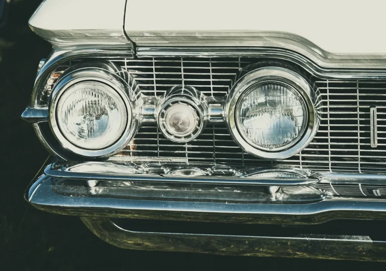 Car headlight being tested for correct beam alignment during an MOT check