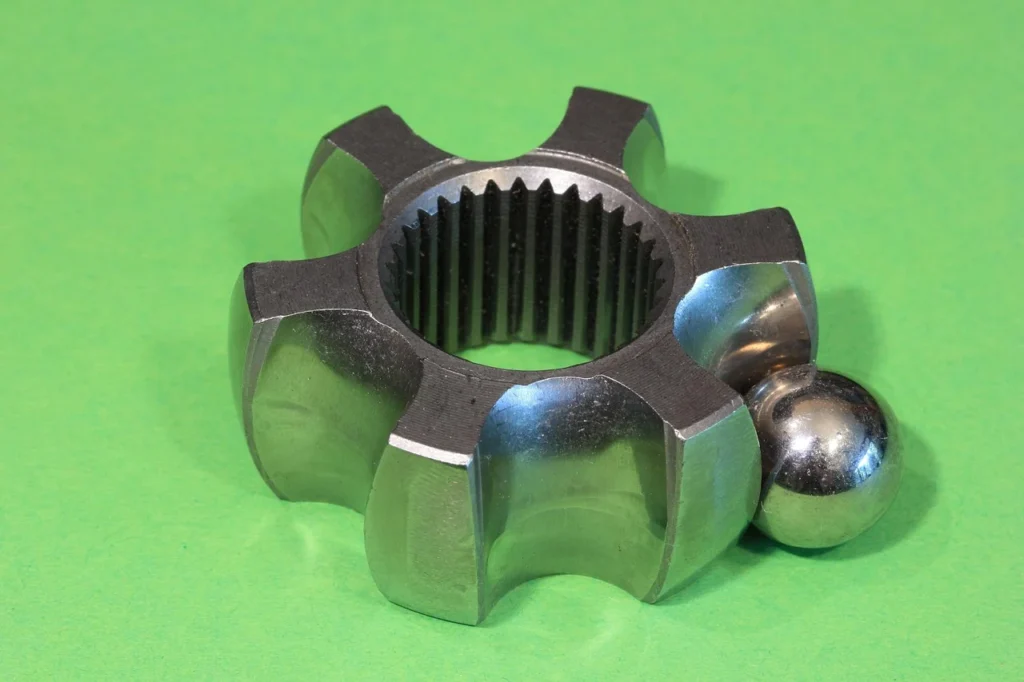 A CV joint and driveshaft boot on the underside of a car