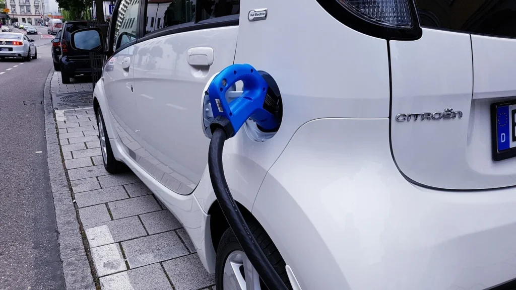Electric car plugged into a charging station