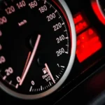 Close up of electric car dashboard warning lights