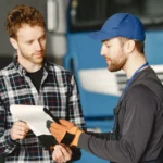 SSK Mechanics technician writing a fixed price quote for a customer