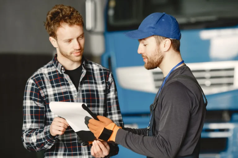 SSK Mechanics technician writing a fixed price quote for a customer