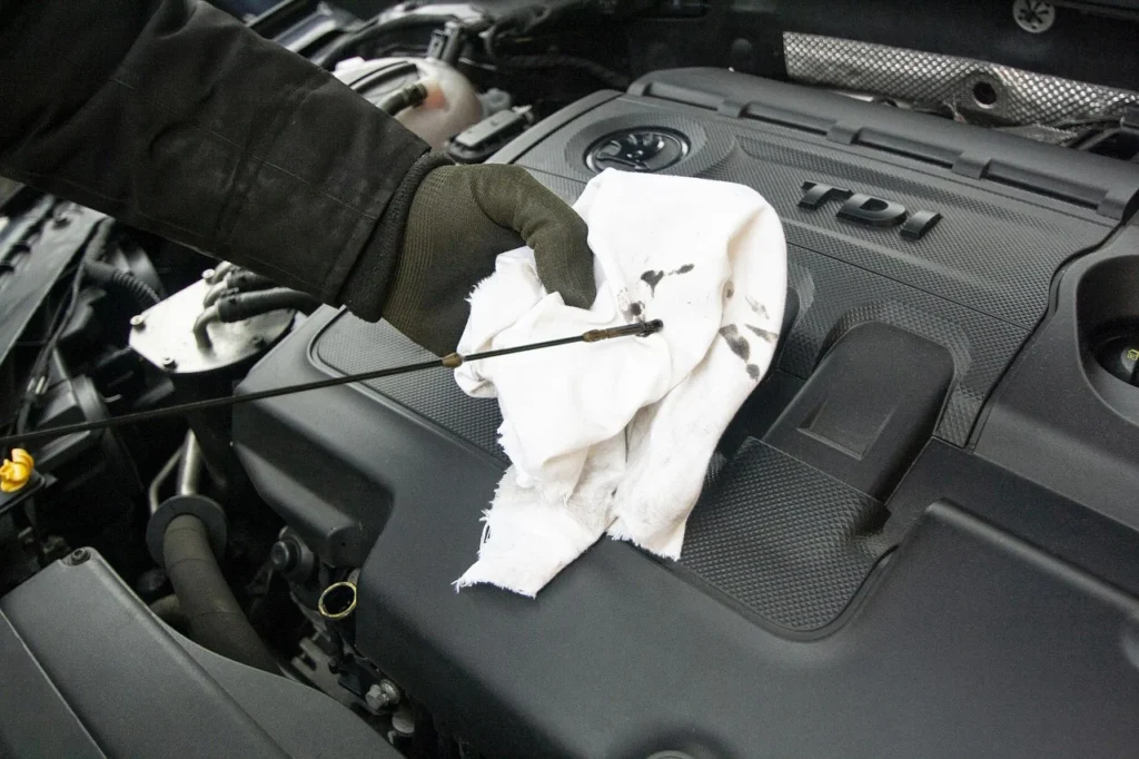 Mobile mechanic doing roadside repair