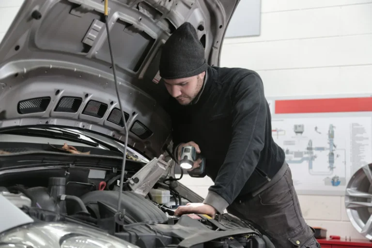 Qualified mobile mechanic carrying out high-voltage EV work at a customer address in West Yorkshire