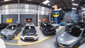 Panoramic view of Vila Nair garage filled with sports cars in São Paulo, Brazil — SSK Mechanics guide to VW Golf Service Checklist: What to Confirm First