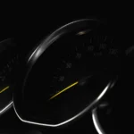 Detailed view of a vehicle speedometer in low light, showcasing speed measurement — SSK Mechanics guide to Audi A1 EPC and Tyre-Pressure Warnings: First Checks