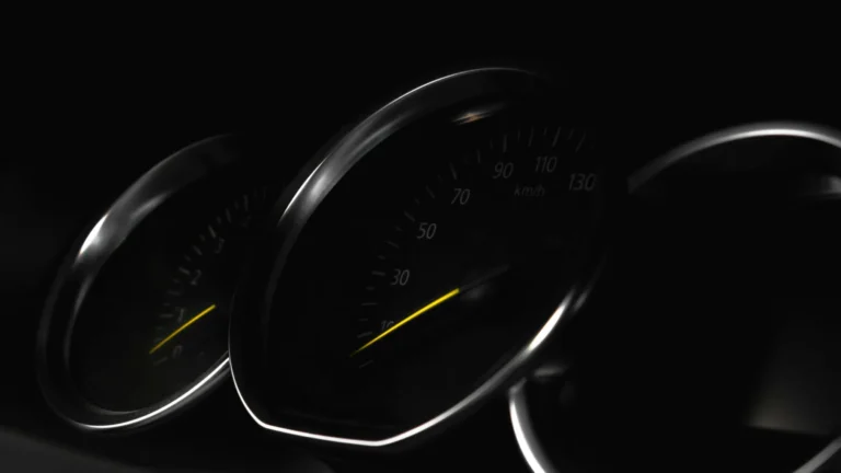 Detailed view of a vehicle speedometer in low light, showcasing speed measurement — SSK Mechanics guide to Audi A1 EPC and Tyre-Pressure Warnings: First Checks
