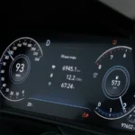 Close-up of a digital car dashboard showing speed and mileage — SSK Mechanics guide to Land Rover Discovery Warning-Light and Diagnostics Guide