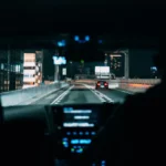View from inside a car driving on a city highway at night, highlighting urban life — SSK Mechanics guide to Citroën C3 Warning-Light and Diagnostics Guide