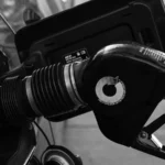 Detailed close-up of a refueling nozzle in monochrome at a gas station, highlighting the petrol… — SSK Mechanics guide to Why Can I Smell Petrol or Diesel Inside or Around My Car