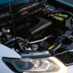 Close-up of a car engine with hood open, showcasing various mechanical components and details — SSK Mechanics guide to Radiator Replacement Cost: What Pushes the Price Beyond the Part