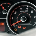 Detailed view of a car dashboard featuring tachometer, odometer, and various indicators — SSK Mechanics guide to Dashboard Warning Lights Explained: What Every Symbol Means…