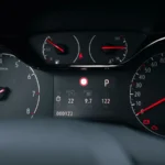 Detailed view of a modern car dashboard with speedometer and fuel gauge indicators — SSK Mechanics guide to ABS Warning Light: What It Means and Is It Safe to Drive