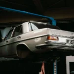 A classic Mercedes-Benz elevated in a car workshop, perfect for automotive themes — SSK Mechanics guide to What Happens After an MOT Fail? Majors, Minors and Dangerous…