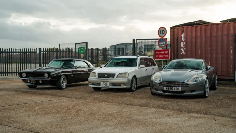 A collection of vintage and modern cars displayed in a UK parking lot, showcasing automotive history — SSK Mechanics guide to Can You Drive Without a Valid MOT? Tax, Insurance and the Law