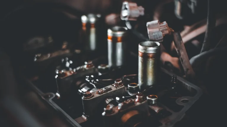 Detailed view of engine parts showcasing camshaft and cylinder head mechanics — SSK Mechanics guide to Spark Plug Wear: The Signs You Need a Replacement