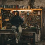 Young adult in an industrial workshop with tools, embracing urban lifestyle — SSK Mechanics guide to Understanding Your MOT: What Gets Checked and How to Prepare