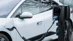Close-up of an electric vehicle charging at a station, showcasing energy-efficient technology — SSK Mechanics guide to The Real Cost of Running an Electric Car vs Petrol