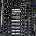 Flat lay of a complete toolset neatly organized in a workshop setting, essential for auto repair… — SSK Mechanics guide to Is a Mobile Mechanic as Good as a Garage