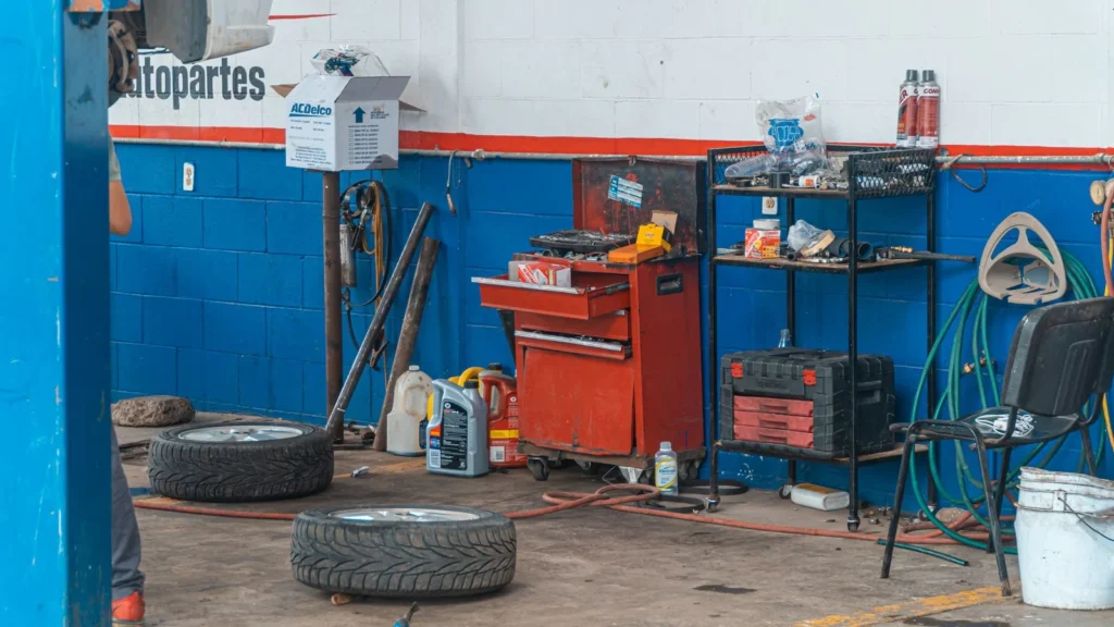 A detailed view of an auto repair garage interior showcasing tools and equipment — SSK Mechanics guide to Maintenance Logs and Record-Keeping for Business Vehicles