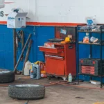 A detailed view of an auto repair garage interior showcasing tools and equipment — SSK Mechanics guide to Maintenance Logs and Record-Keeping for Business Vehicles