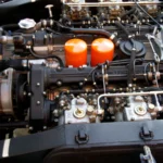 Close-up of an intricate sports car engine showcasing technology and engineering — SSK Mechanics guide to Fuel Injectors Explained: Why They Get Dirty and What It…