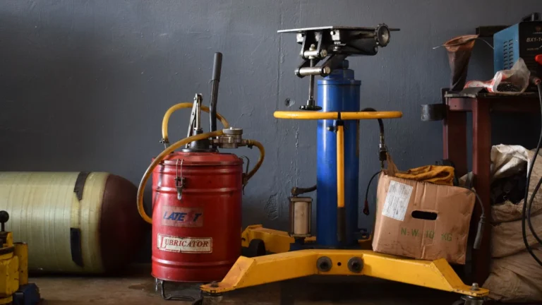 A well-equipped workshop features various machinery and an industrial lubricator — SSK Mechanics guide to National Chain Seasonal Offers vs Mobile Seasonal Servicing:…