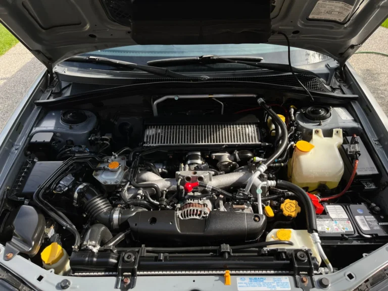 Thermostat replacement in a car engine