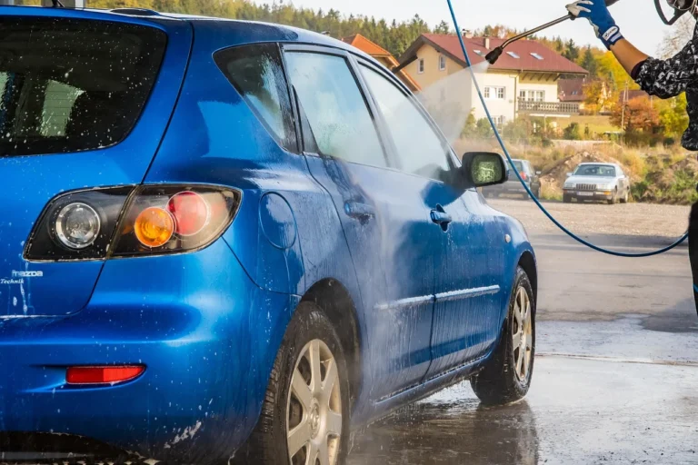 Topping up screen wash before winter