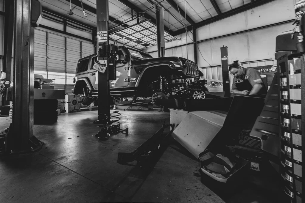 Tradesperson's van being serviced on site by a mobile mechanic