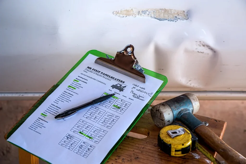 Used car buying checklist on clipboard